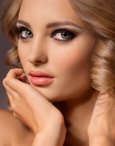 Portrait of beautiful young woman with makeup - Foto, Imagem