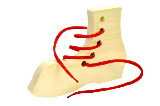 Wooden toys for the development of motor movements in children against white background - Photo, image