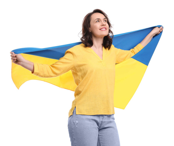 Happy woman with flag of Ukraine on white background - Fotografie, Obrázek