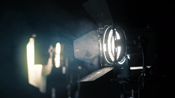 Professional lighting equipment on the movie set with smoke in the air - Footage, Video