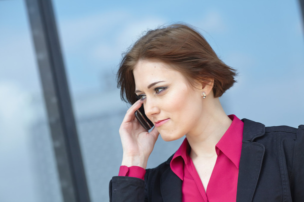 Businesswoman with mobile phone - Photo, Image