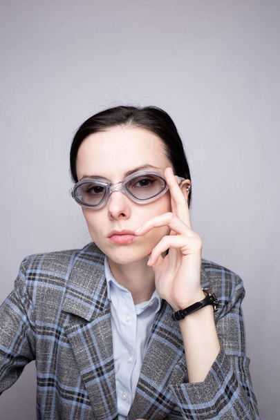 woman manager  wearing swimming goggles - Foto, Imagen