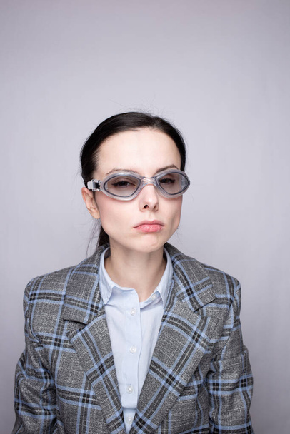 woman office worker wearing glasses for the pool - Zdjęcie, obraz