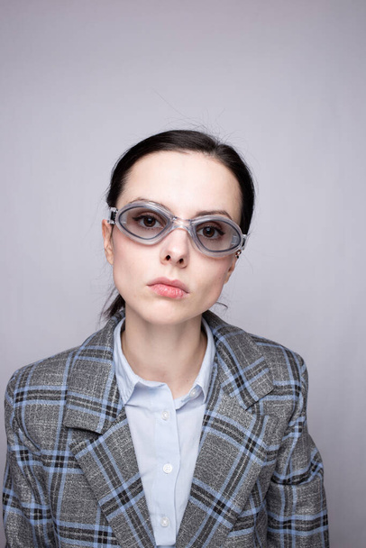 woman office worker wearing glasses for the pool - Fotoğraf, Görsel