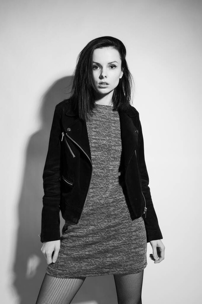 beautiful woman in leather jacket, black and white photography - Fotó, kép