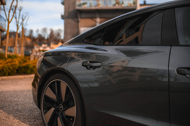 Skien, Norway - April 9, 2021:  grey Audi e-Tron GT is a new grand touring electric sports car - Foto, afbeelding