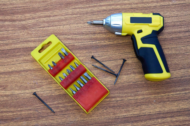 Cordless screwdriver with a set of nozzles, DIY repair. - Photo, Image
