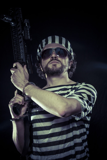 Prisoner with a machine gun - Photo, Image