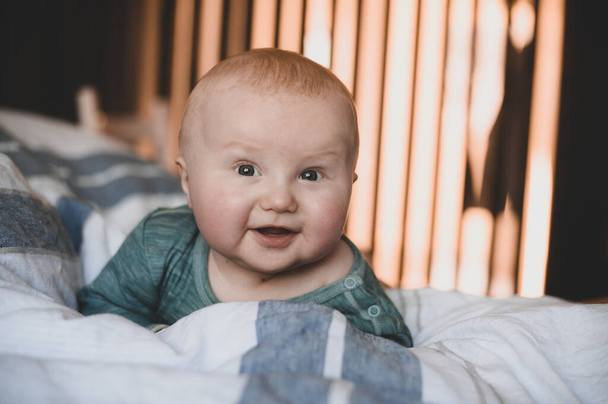 close up portrait of cute smiling baby boy. Happy childhood - Zdjęcie, obraz