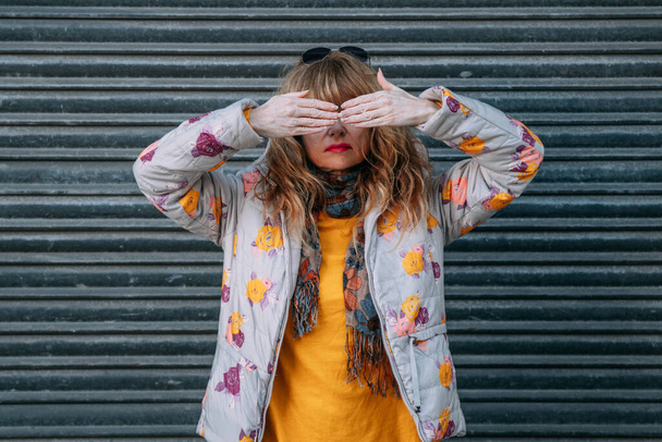 adult woman covering face with hands - Photo, Image