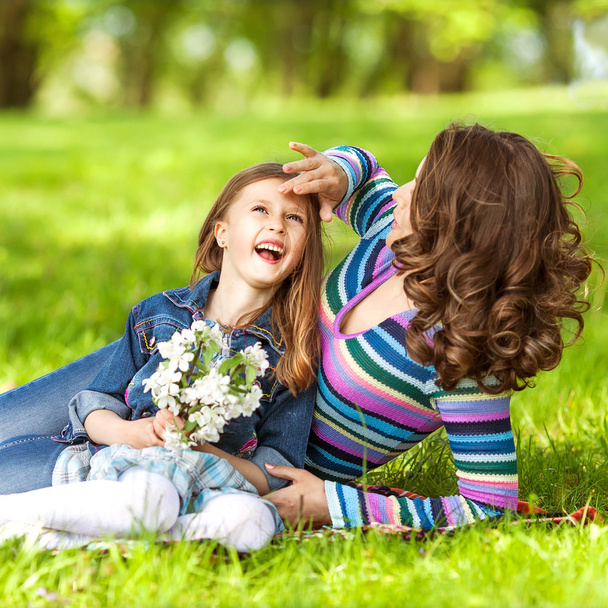Mother and daughter in park. Mother Day. - Φωτογραφία, εικόνα