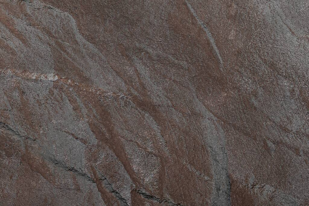 Fondo de piedra oscura o textura rocosa. Textura de diseño de pared de alta resolución - Foto, imagen