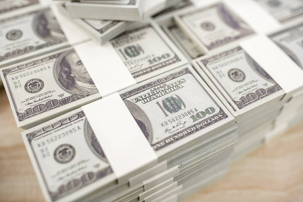 American Dollars Cash Money. One Hundred Dollar Banknotes. Stack of one hundred dollar bills .shallow focus effect. - Photo, Image