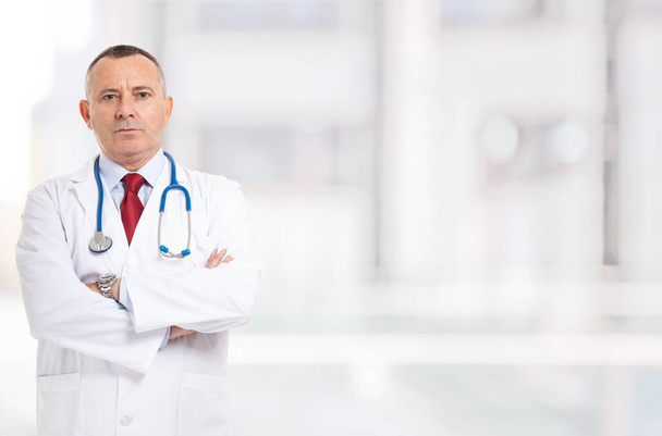 Portrait of a doctor in front of a bright background - Photo, Image