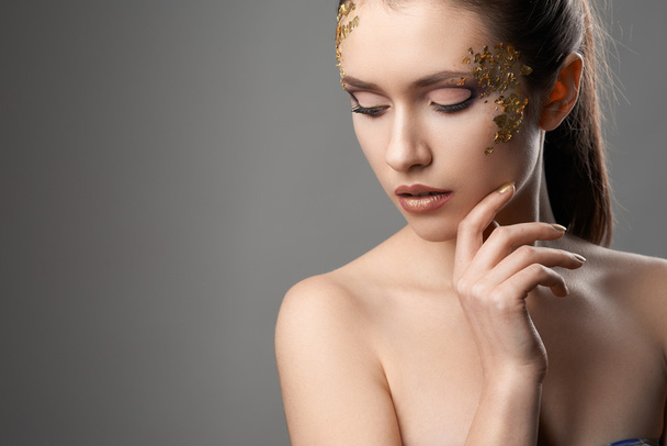 pretty girl with golden make-up art - Photo, Image