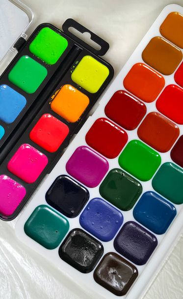 Bright colorful watercolor paints for painting, close-up - Photo, Image