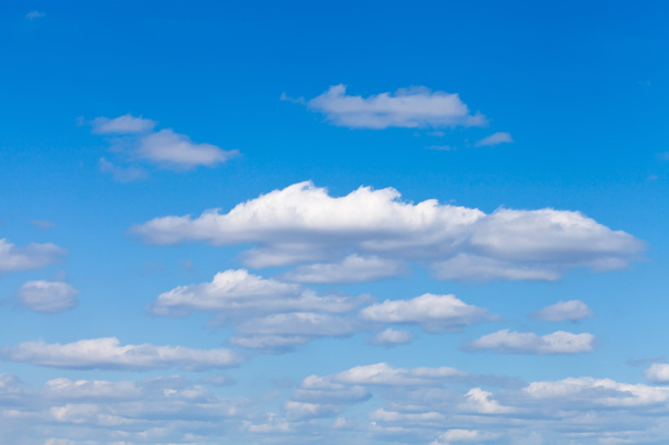 little fluffy white clouds in blue sky - Photo, Image