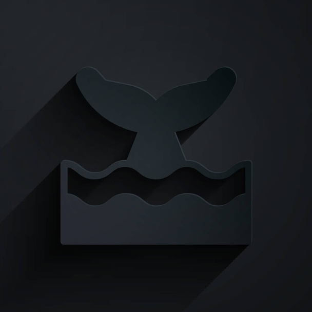 Taglio di carta coda di balena nell'icona dell'onda oceanica isolata su sfondo nero. Stile cartaceo. Vettore. - Vettoriali, immagini