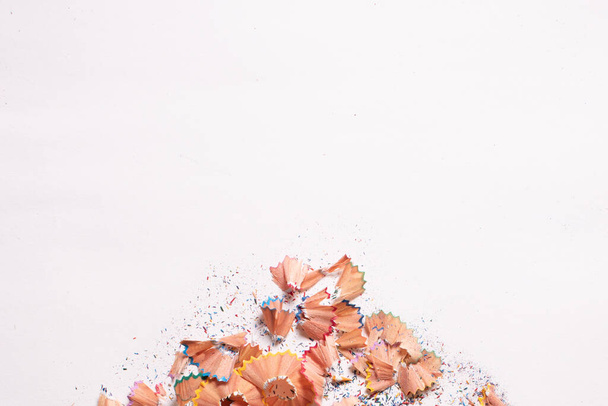Colored shavings over white background. Top view - Photo, Image
