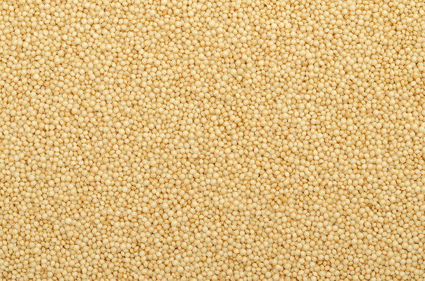 Amaranto superfície de grãos e fundo. Sementes minúsculas de Amaranto, um pseudocereal sem glúten semelhante à quinoa, alimento básico e fonte de proteína dos astecas. Close-up, de cima, foto de comida. - Foto, Imagem
