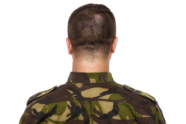 voják v maskování, stojící na bílém pozadí - Fotografie, Obrázek