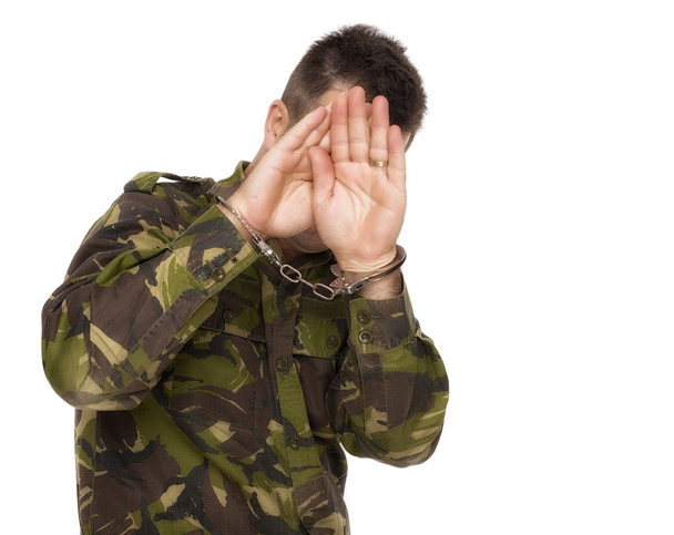 στρατιώτης που κρύβει το πρόσωπό του να μην μπουν - Φωτογραφία, εικόνα