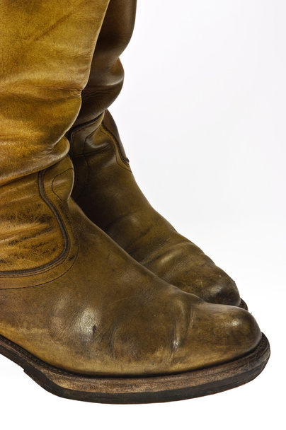 Old worn cowboy style boots from the seventies of the twentieth century - isolated - Photo, Image