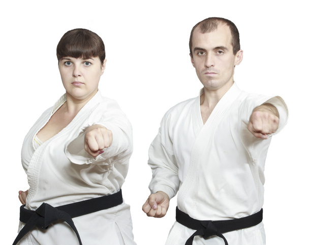 Hombre y mujer en karategi son entrenamiento golpe mano
 - Foto, Imagen