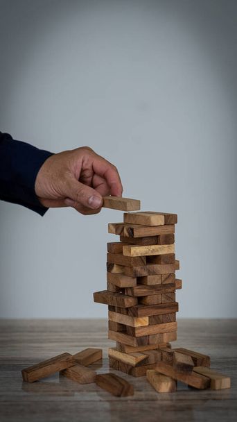 Risk Planning and Strategy in Business Gambling Business Place Wood Blocks on Tower Building Business Ideas. - Foto, Imagen