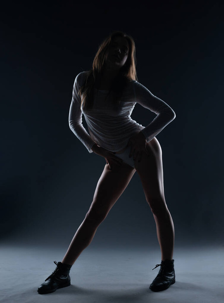 Art nude, perfect naked body, sexy young woman on dark background,photography, studio shot - Zdjęcie, obraz