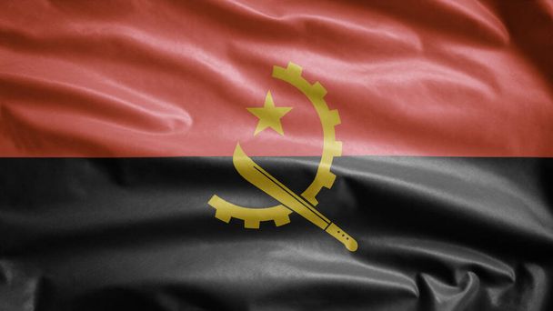 Angolan flag waving in the wind. Close up of Angola banner blowing, soft and smooth silk. Cloth fabric texture ensign background. Use it for national day and country occasions concept. - Photo, Image
