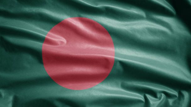Bandera de Bangladesh ondeando en el viento. Primer plano de la bandera de Bangladesh que sopla, seda suave y lisa. Tejido de tela textura ensign fondo. - Foto, Imagen