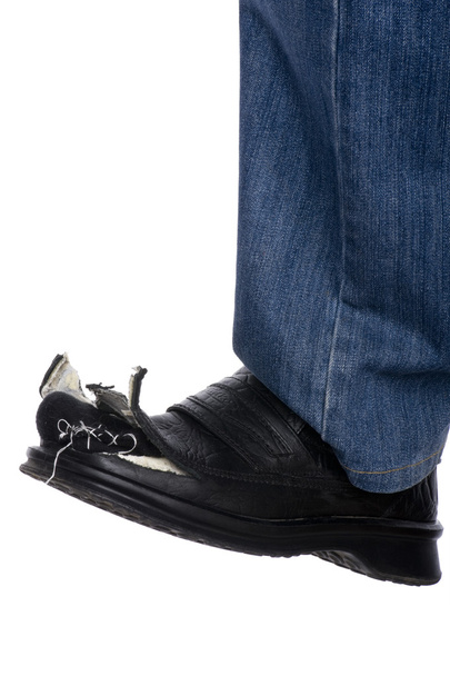 Homens de calça azul e botas
 - Foto, Imagem