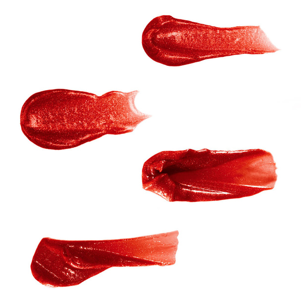 Isolierte Probe von rotem Lippenstift. Proben von Kosmetika - Foto, Bild