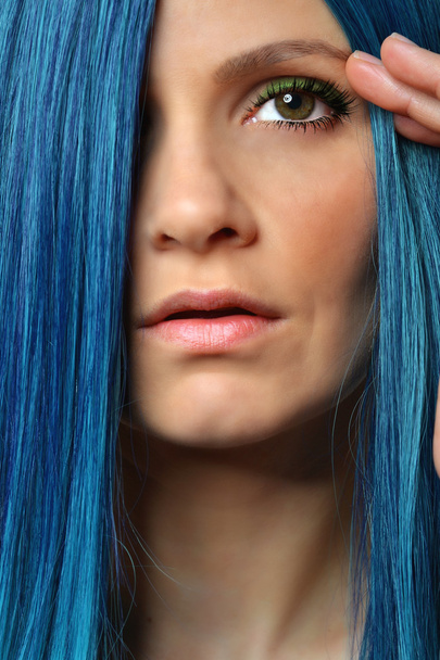 Young beautiful woman with blue hair - Фото, изображение