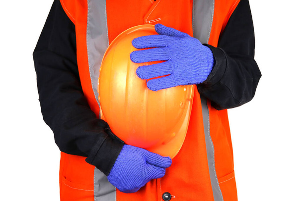 ingegnere tiene casco arancione, isolato su bianco - Foto, immagini