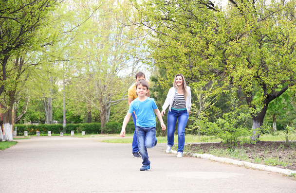 Happy family, walk in the park - Foto, imagen