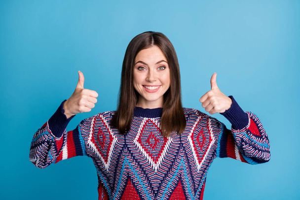 Portrait of pretty glad cheerful brown-haired girl showing double thumbup isolated over vibrant blue color background - Valokuva, kuva