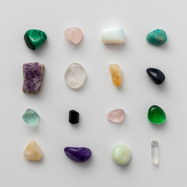 Beautiful gentle pattern made of natural crystals which are used for energy and spiritual healing. Flat lay composition. - 写真・画像
