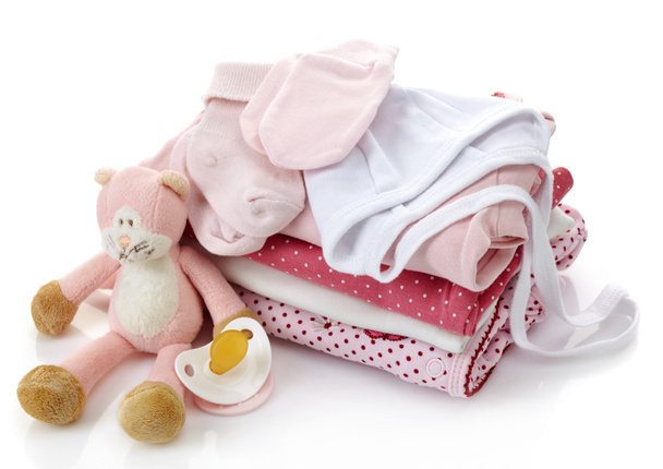 Куча розовой детской одежды
 - Фото, изображение