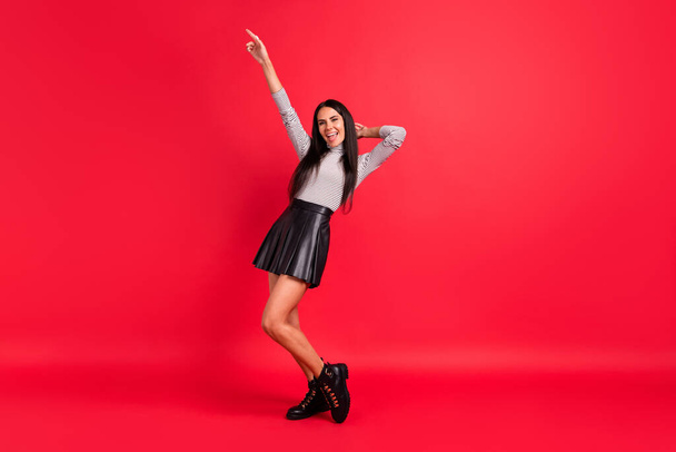 Full length photo of charming stunning young woman point finger up dance party isolated on red color background - Valokuva, kuva