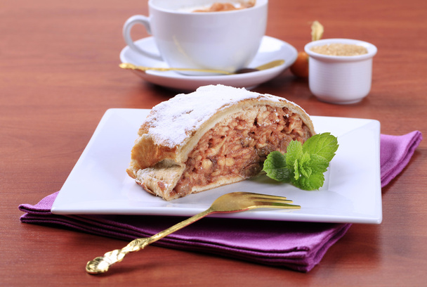 Slice of apple strudel and a cup of coffee - Photo, Image