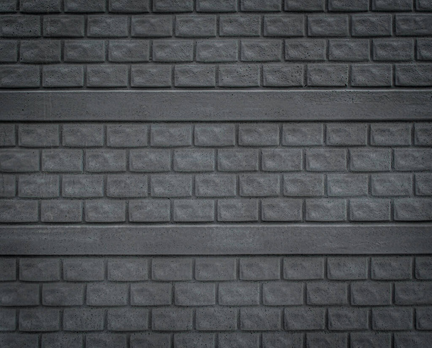 pared de ladrillo gris oscuro o textura de valla. ladrillo de imitación - Foto, Imagen