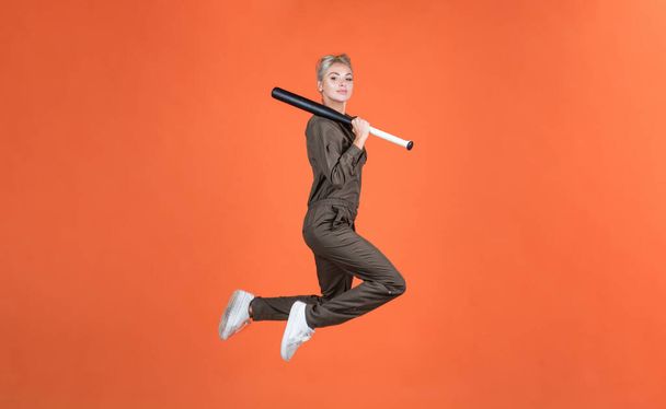 success. sports and games. cricket player on orange background. - Foto, Imagen