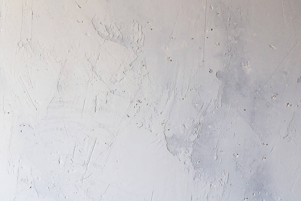 Old white grey concrete wall with plaster and paint, abstract background texture - Fotoğraf, Görsel