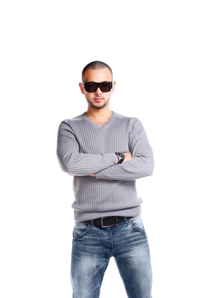 Casual friendly man in jeans and pullover - isolated over a white background - Foto, Imagen