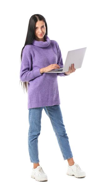 Beautiful young woman with laptop on white background - Foto, Imagem