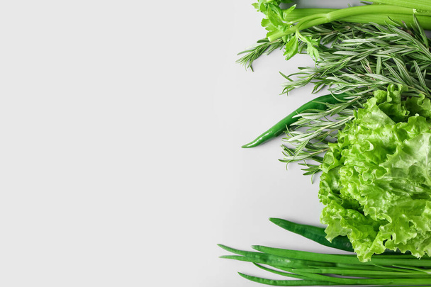 Healthy green herbs on grey background - Foto, immagini