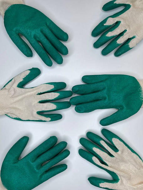 Tamir ve ev işleri için bahçe eldivenleri. - Fotoğraf, Görsel