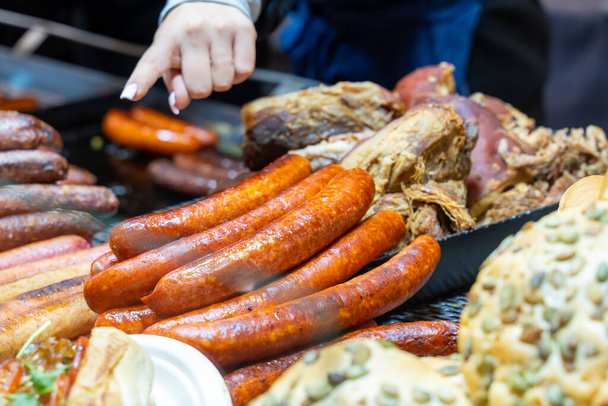 assorted meat sausages beer snack, street food holiday market - Фото, зображення
